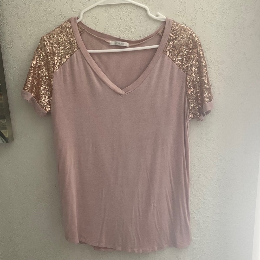 Pink shirt with sparkly sleeves